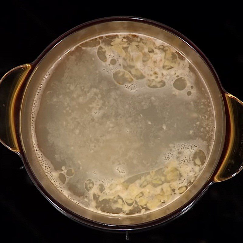 Step 3 Cooking hotpot Squid hotpot with mushrooms