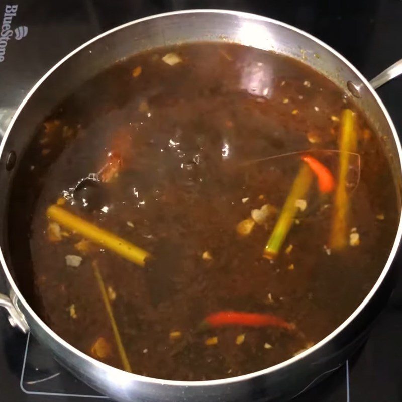 Step 2 Cook the hot pot for super simple tom yum hot pot using seasoning packet