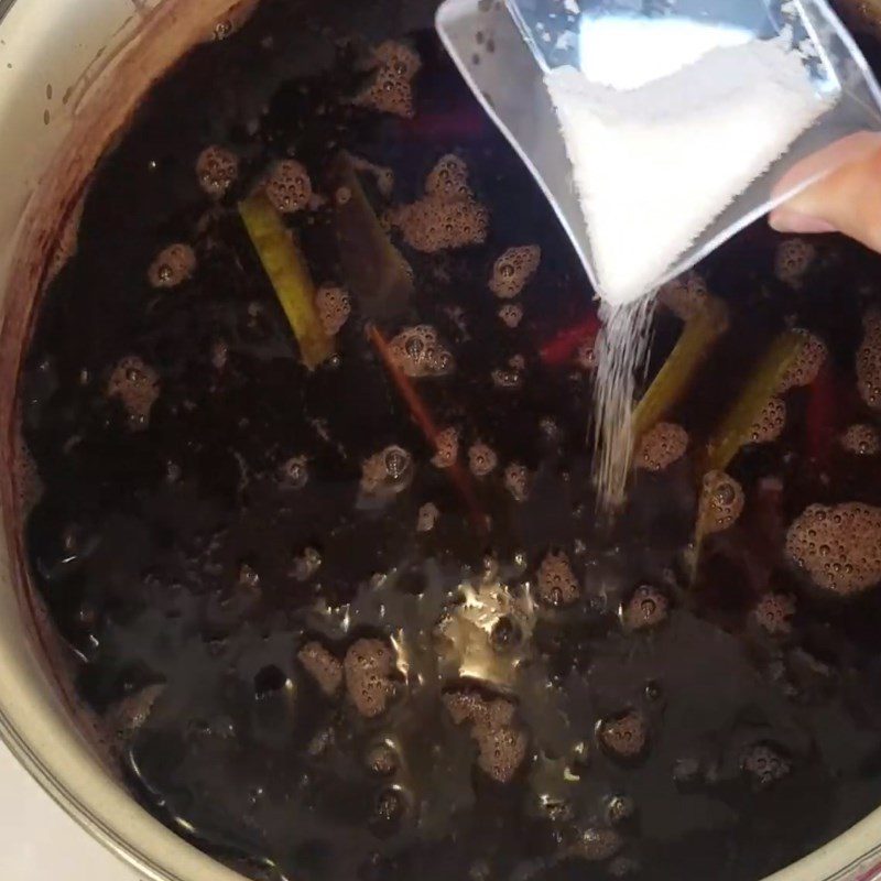 Step 3 Cook black sticky rice with taro and sweet potato Black sticky rice dessert with sweet potato and taro