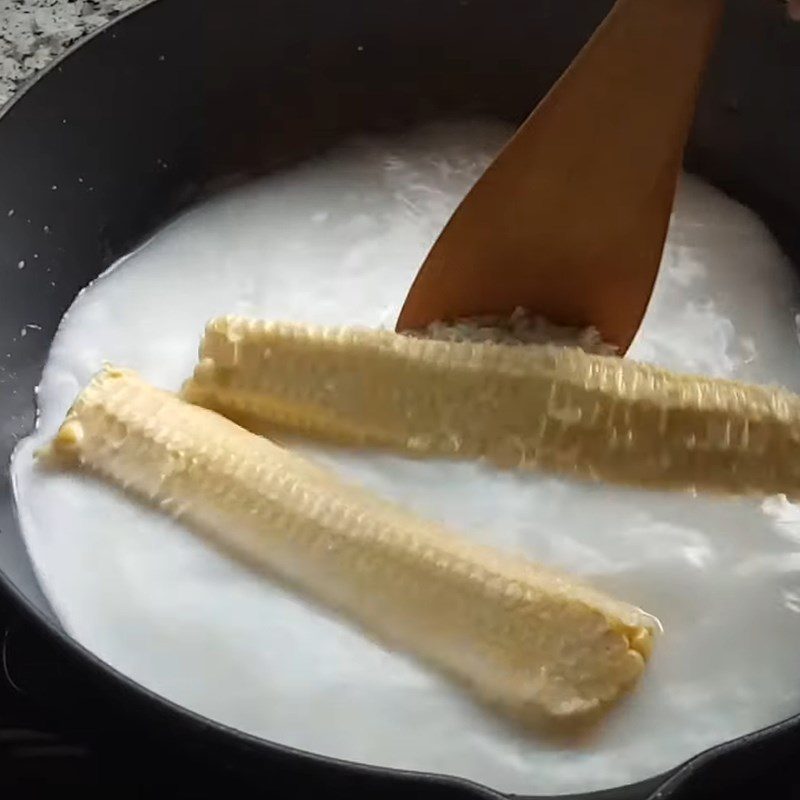 Step 3 Cook the sticky rice with coconut milk Sweet corn with sticky rice