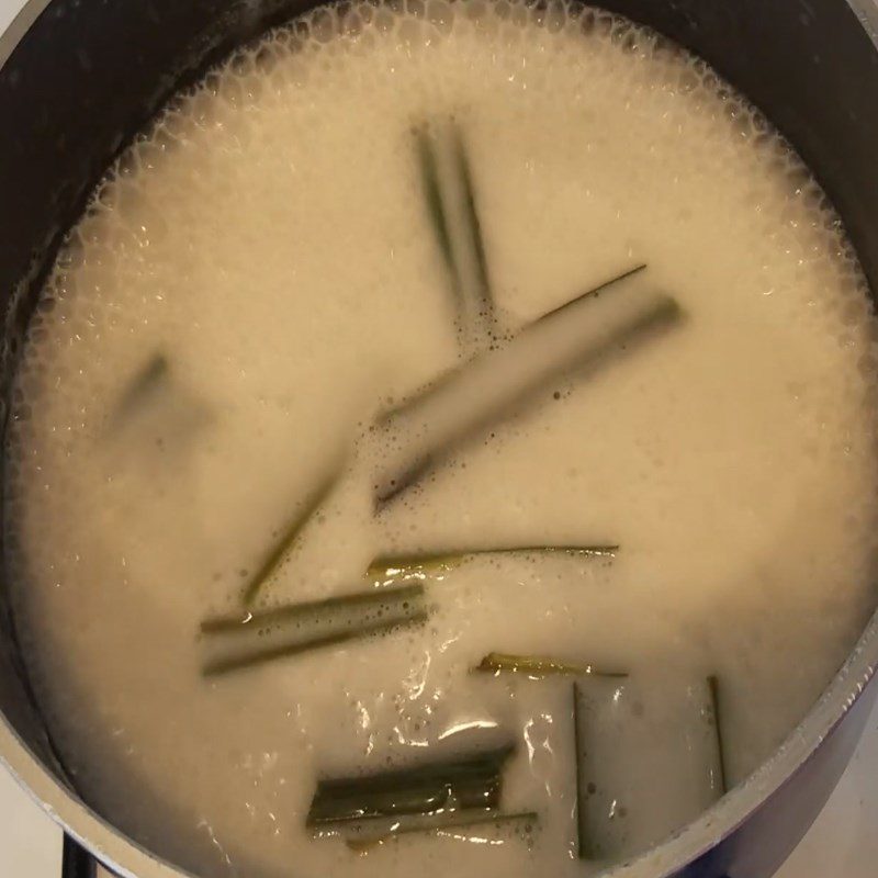 Step 4 Cook coconut milk Black sticky rice with sweet potato and taro