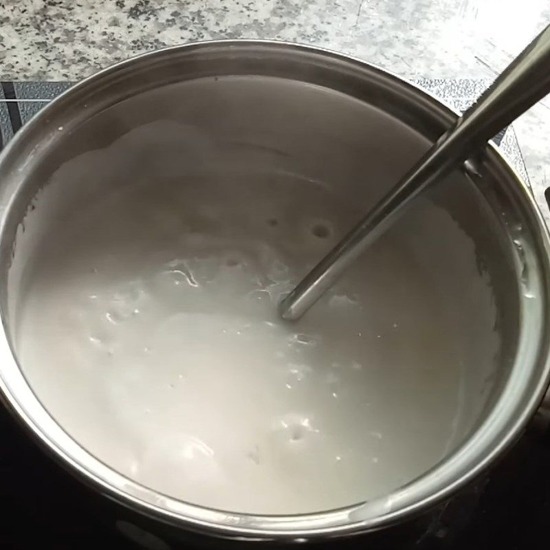 Step 5 Cooking coconut milk Corn pudding with sticky rice