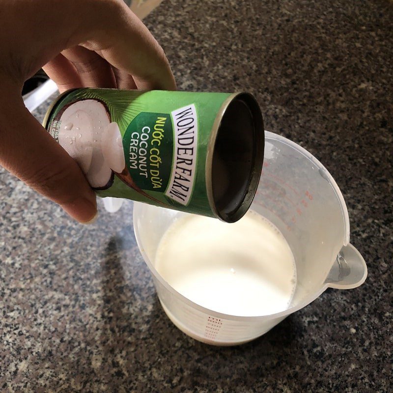 Step 5 Cook coconut milk for black bean dessert with butterfly pea jelly using a pressure cooker