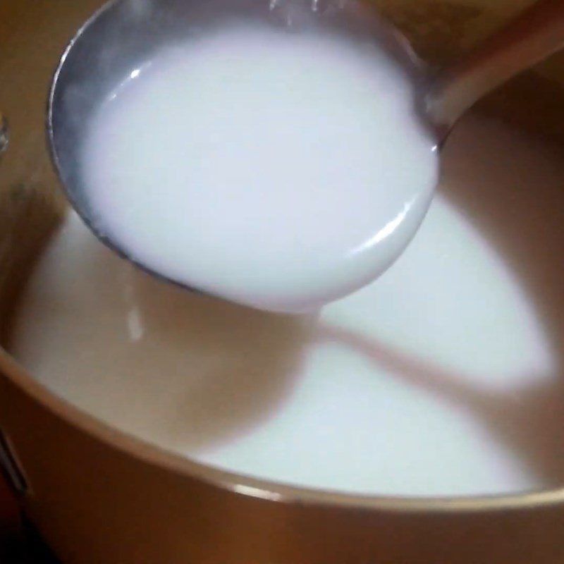 Step 2 Cooking coconut milk Black sticky rice - white sticky rice