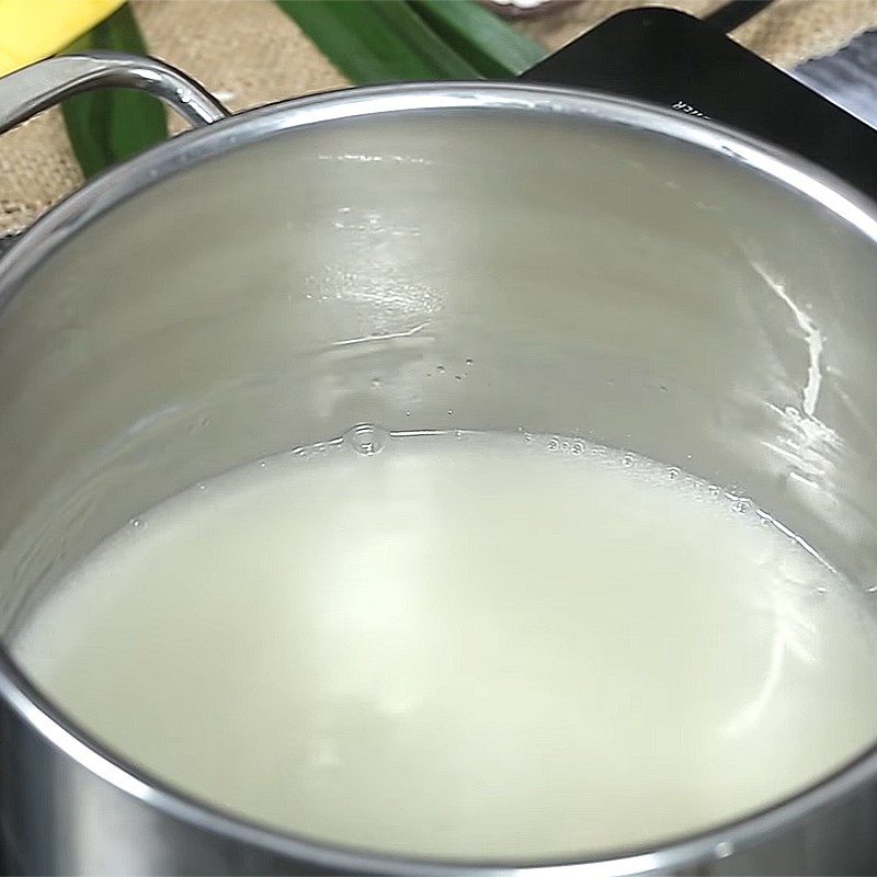 Step 2 Cook the pandan coconut milk for Mango Sticky Rice with Pandan Leaves