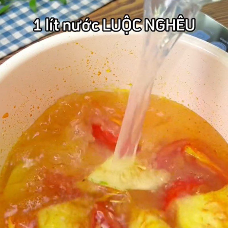 Step 3 Cooking the broth for sour and spicy clam noodle soup (Recipe shared from Tiktok Cooking with TasteVN)