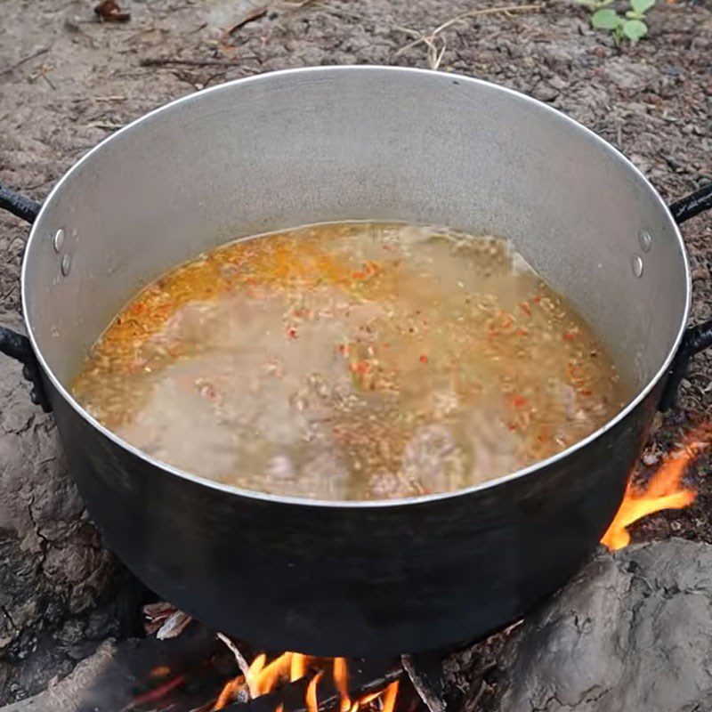 Step 3 Cooking the sour rice broth Catfish hotpot