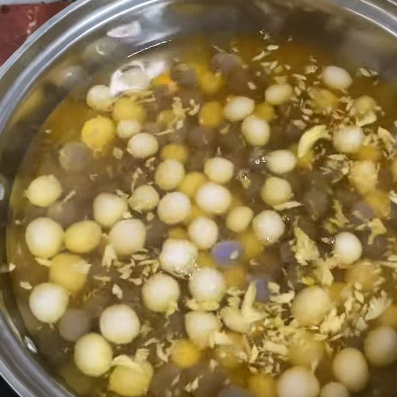 Step 4 Cooking the syrup Blue pea flower dessert