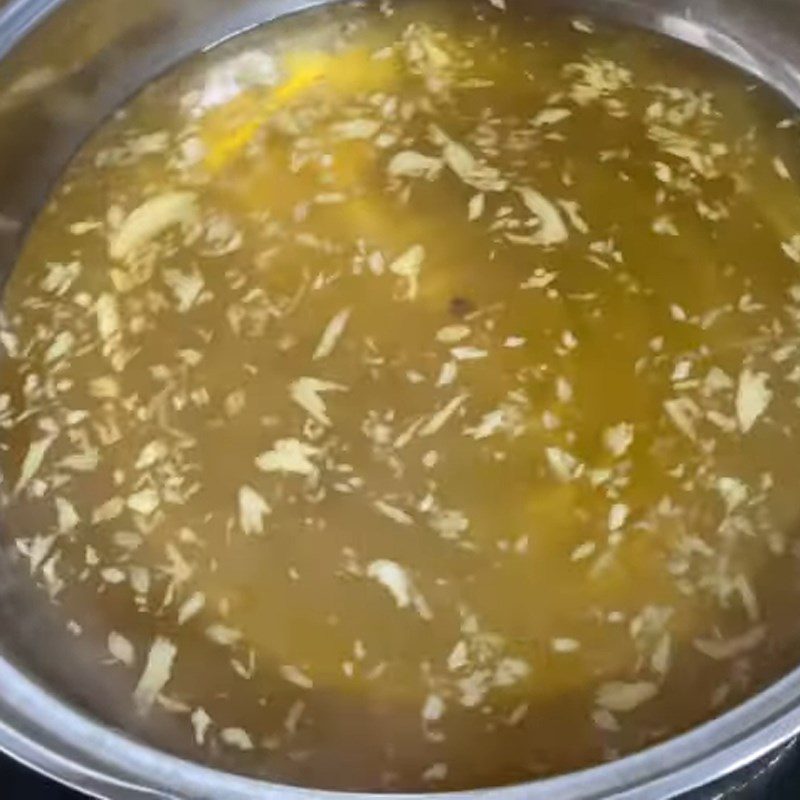 Step 4 Cooking the syrup Blue pea flower dessert