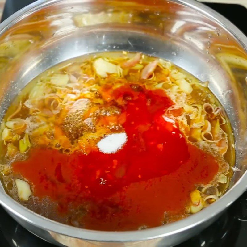 Step 2 Cook spicy tamarind hotpot broth Spicy tilapia hotpot