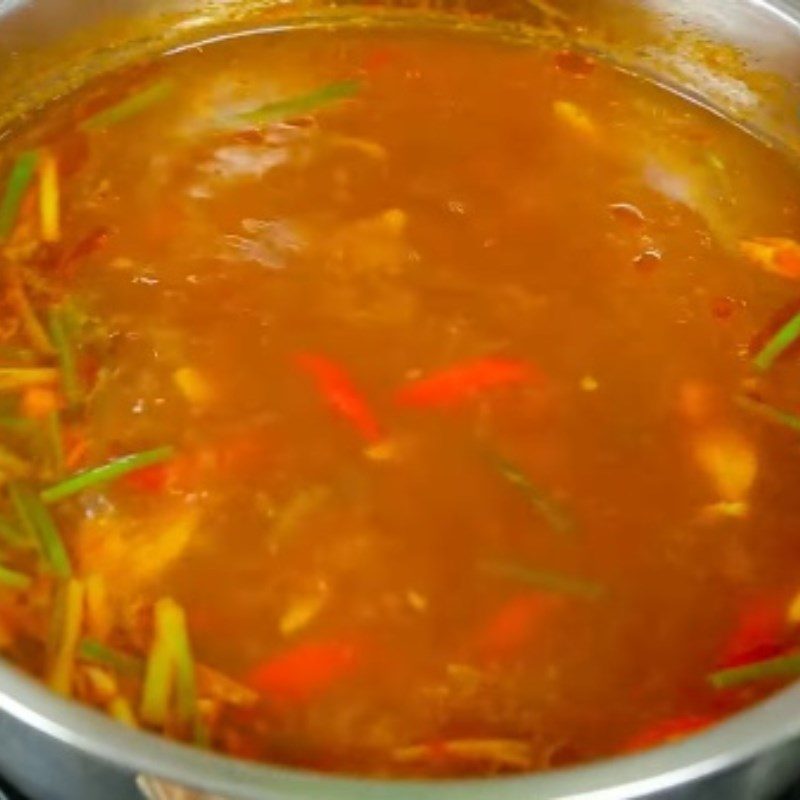 Step 2 Cook spicy tamarind hotpot broth Spicy tilapia hotpot