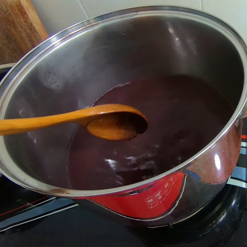 Step 3 Cooking black sticky rice milk Sweetened condensed black sticky rice