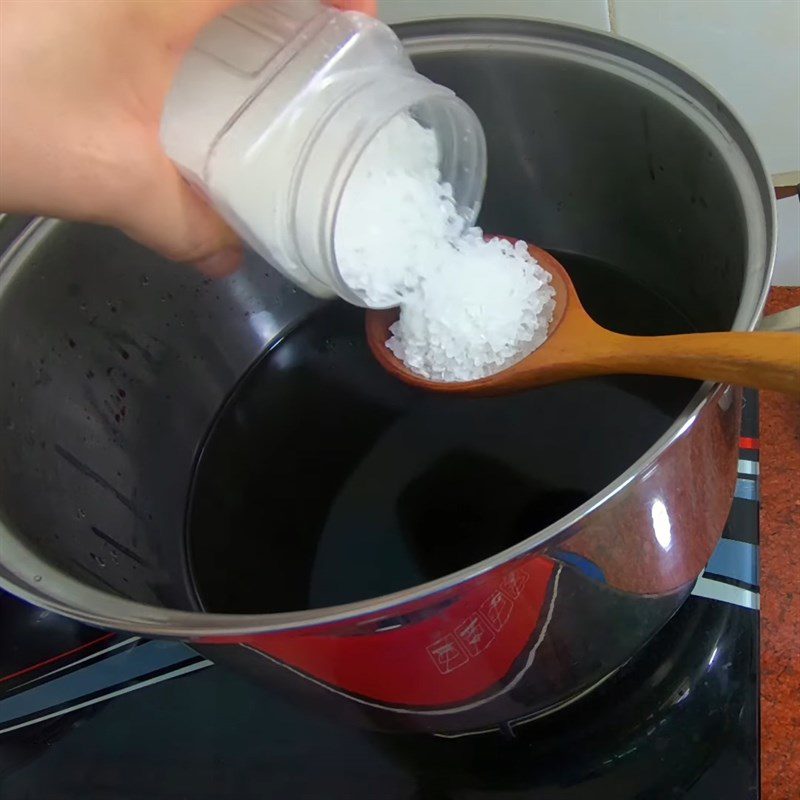 Step 3 Cooking black sticky rice milk Sweetened condensed black sticky rice