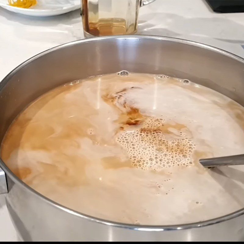 Step 2 Cook milk and stir in the milk coffee bag