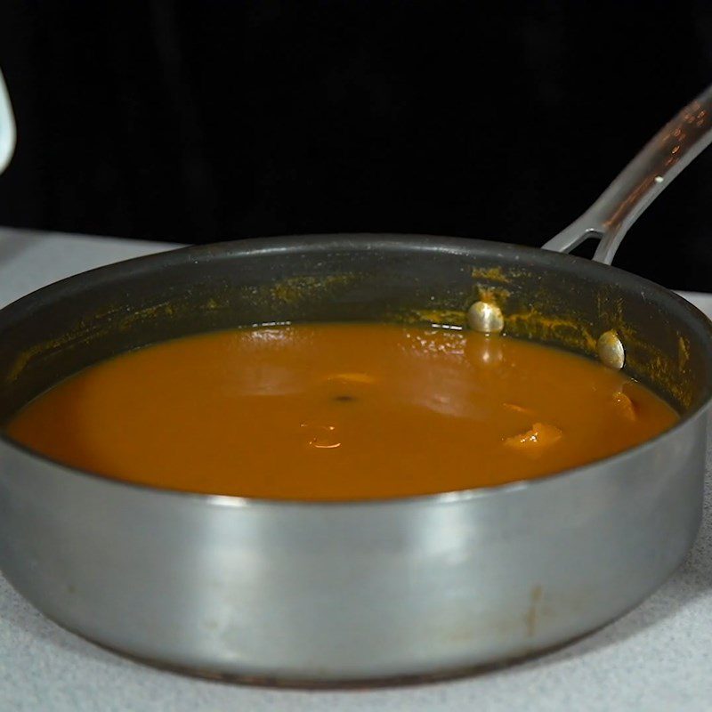 Step 3 Cook and filter pumpkin juice Pumpkin juice cooked with star anise