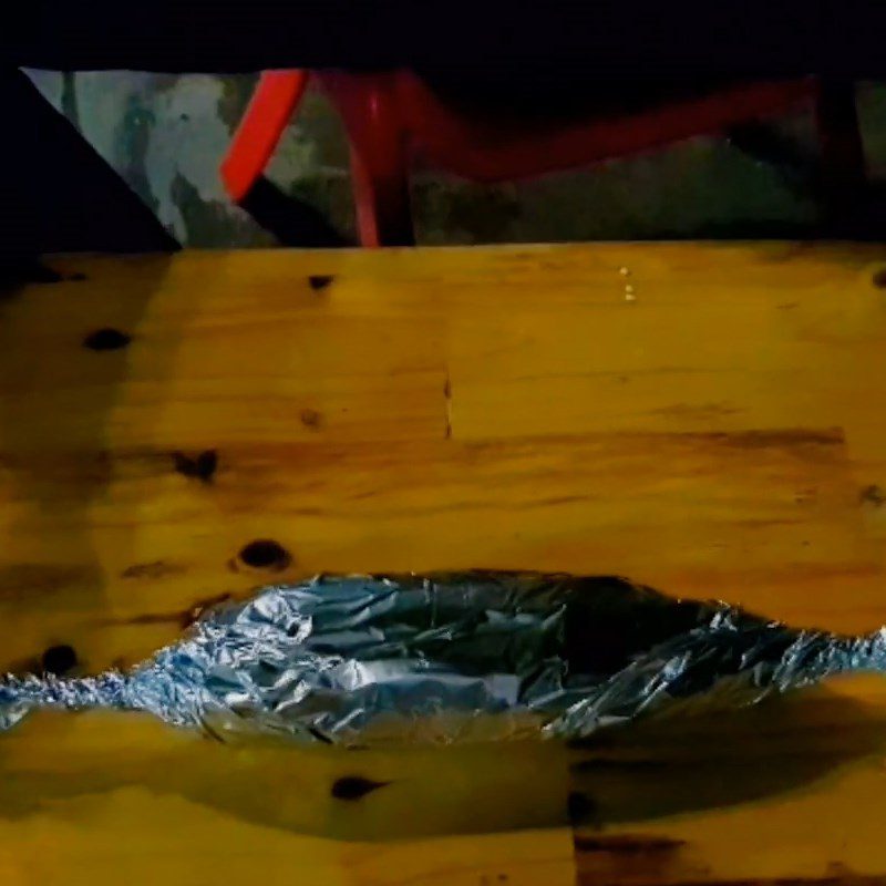 Step 3 Grilling the fish Fish wrapped in foil