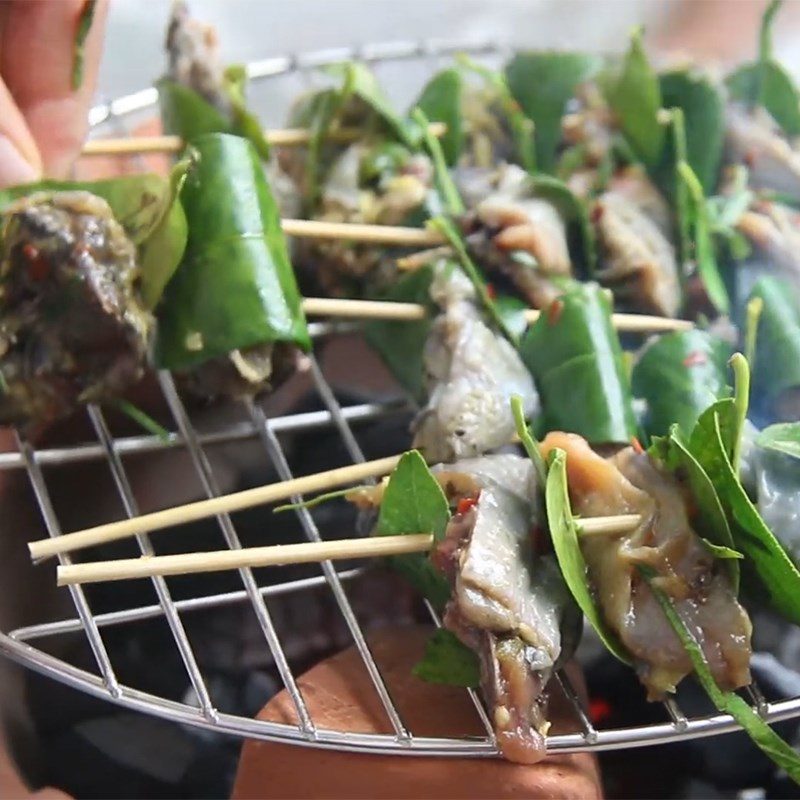 Step 4 Grilled Chicken Grilled black chicken with lime leaves and shallots