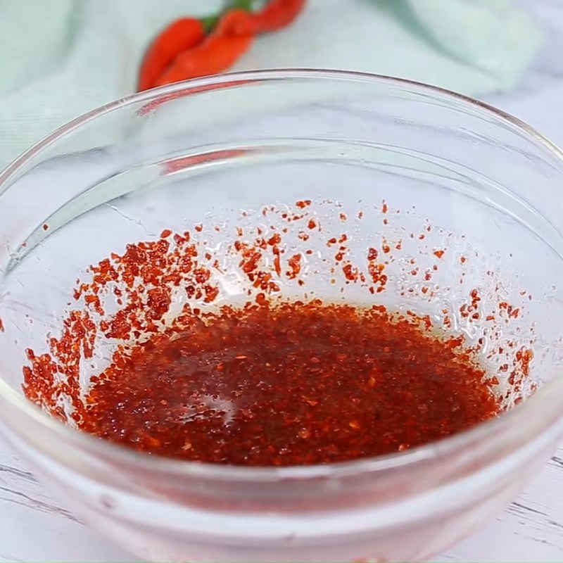 Step 2 Mixing chili fish sauce for mango and sour fruit salad with dried beef