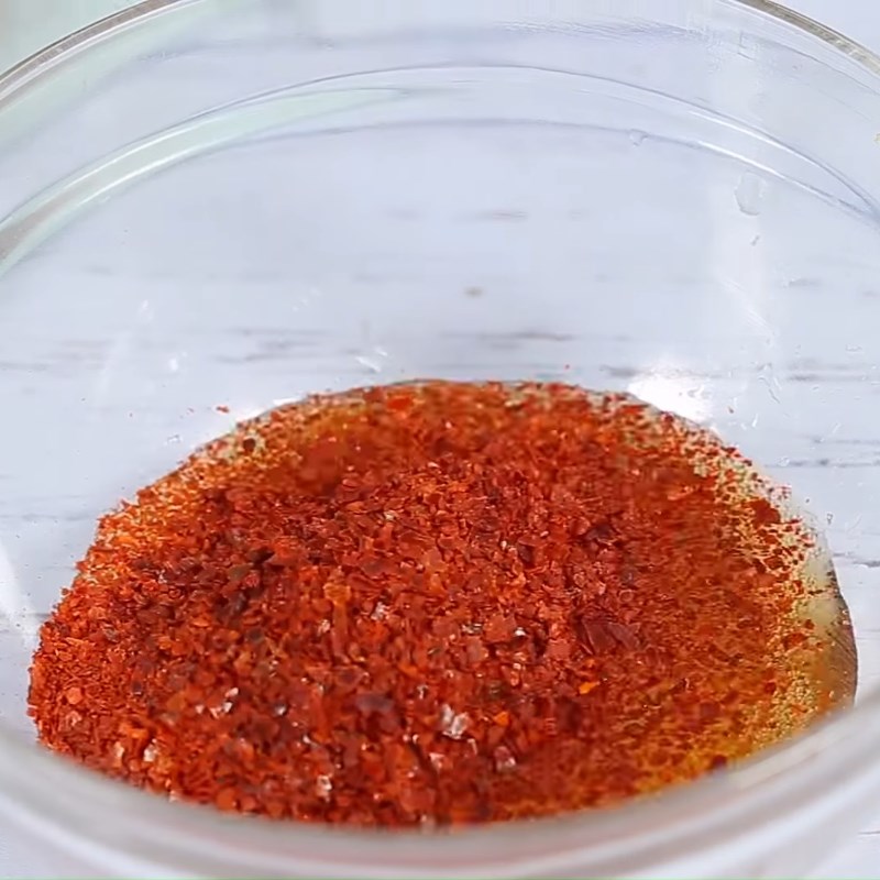 Step 2 Mixing chili fish sauce for mango and sour fruit salad with dried beef