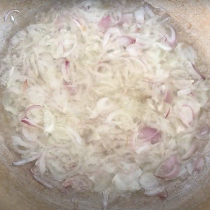 Step 4 Sautéing Red Onions for Sour Bamboo Shoot Fish Hotpot