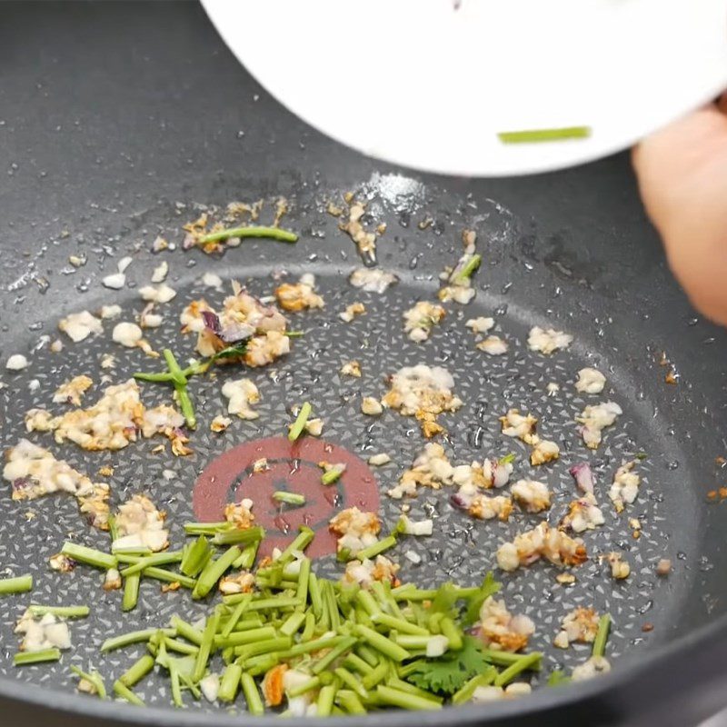 Step 4 Fry the spices for Beef Salad with Rice Paddy Herb