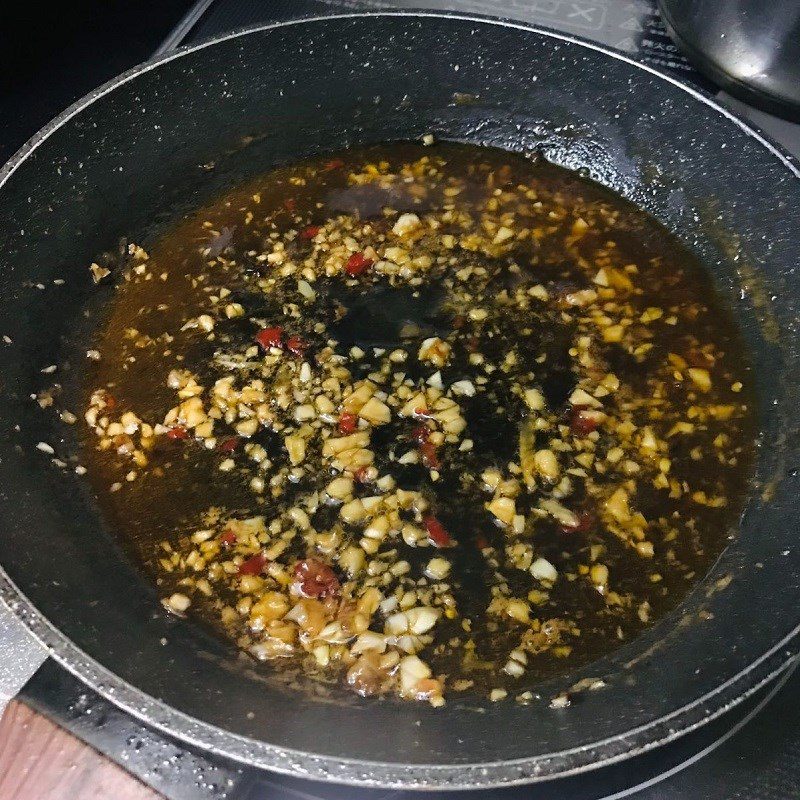 Step 5 Simmer mackerel with fish sauce Mackerel with fish sauce