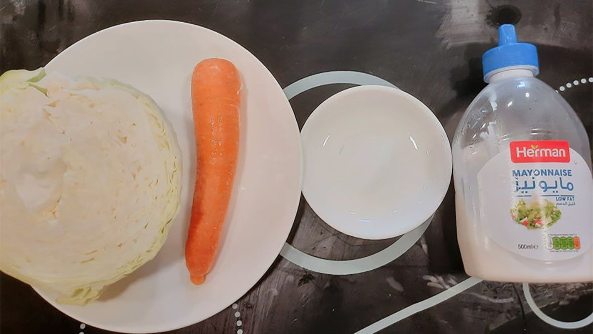Ingredients for cabbage salad mixed with mayonnaise