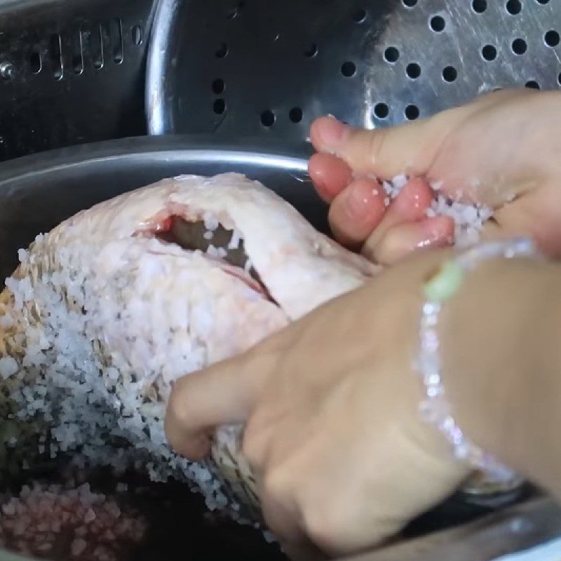 Step 1 Prepare the carp for Carp Hotpot