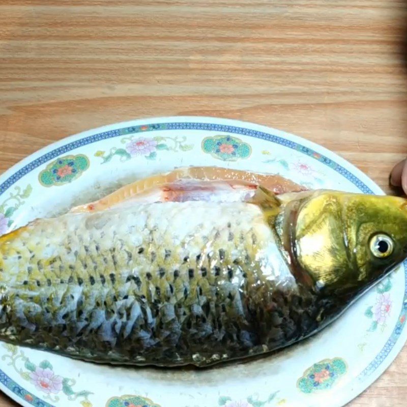 Step 1 Prepare carp for Carp Lotus Seed Porridge