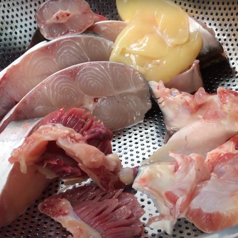 Step 1 Prepare the fish for Fish hotpot with sour bamboo shoots
