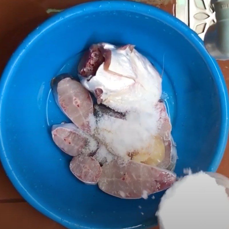 Step 1 Prepare the fish for Fish hotpot with sour bamboo shoots