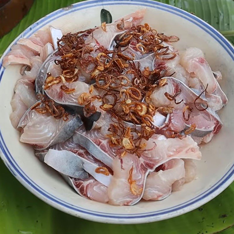 Step 1 Prepare catfish for catfish hotpot with fermented rice