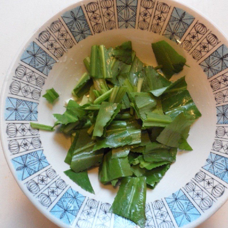 Step 2 Prepare the vegetables for Sour Fish Soup with Linh Fish and Water Lily Flowers