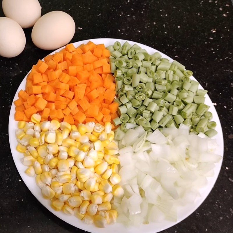 Step 2 Preparing vegetables Quinoa mixed with vegetables cooked in a rice cooker