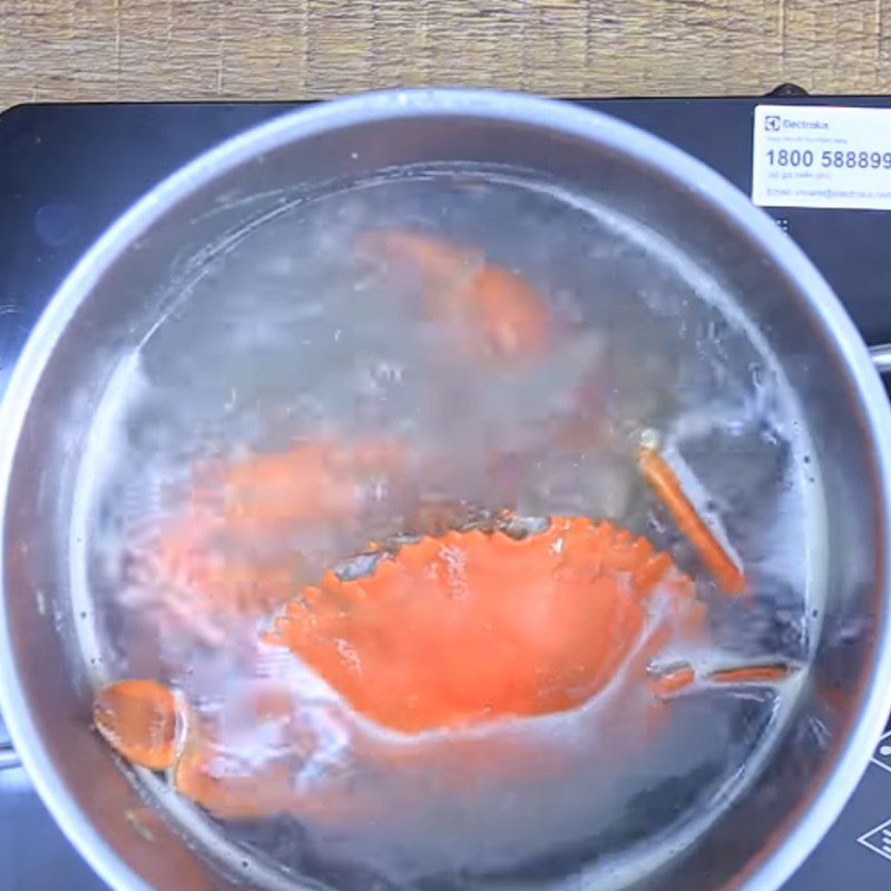 Step 1 Prepare the crab for Crab porridge with water spinach