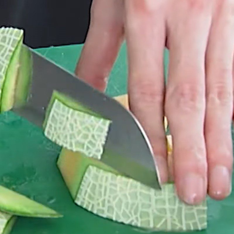 Step 1 Prepare the melon for Melon Grass Jelly Dessert