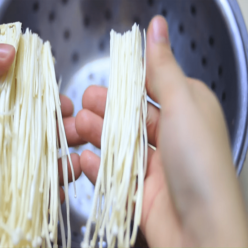 Step 1 Prepare the mushrooms for Pork belly rolls with enoki mushrooms