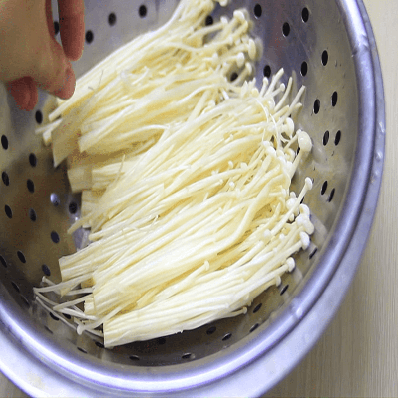 Step 1 Prepare the mushrooms for Pork belly rolls with enoki mushrooms