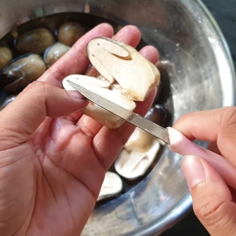 Step 1 Prepare straw mushrooms Stir-Fried Straw Mushrooms with Pickled Mustard Greens