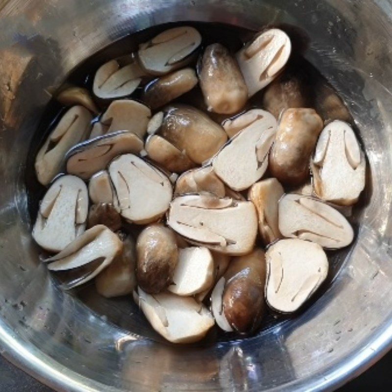 Step 1 Prepare straw mushrooms Stir-Fried Straw Mushrooms with Pickled Mustard Greens