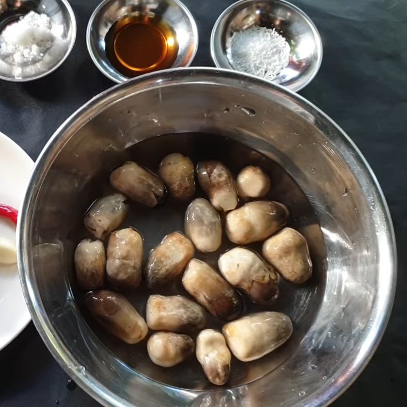 Step 1 Prepare straw mushrooms Stir-Fried Straw Mushrooms with Pickled Mustard Greens