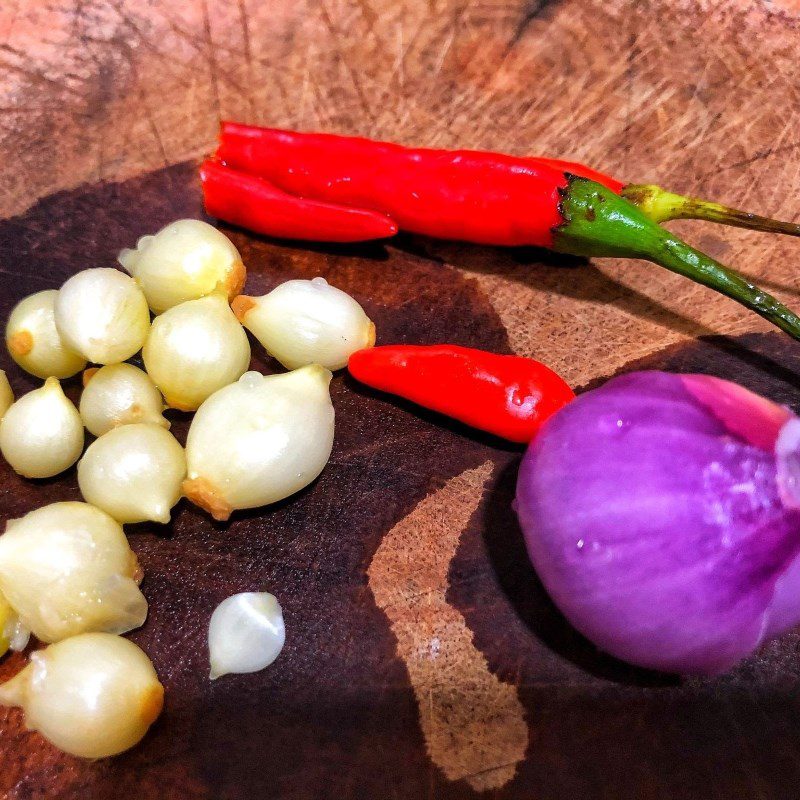 Step 1 Prepare the ingredients for clam porridge with lotus seeds