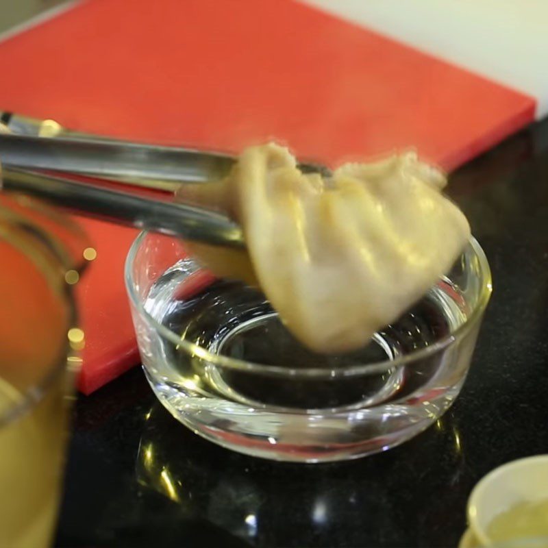 Step 1 Prepare the pork ear for Pork Ear Salad with Lotus Stem