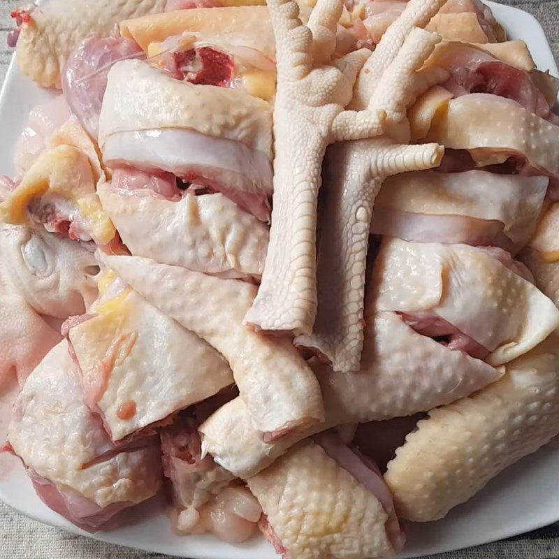 Step 1 Prepare the chicken for Chicken Hotpot with giang leaves