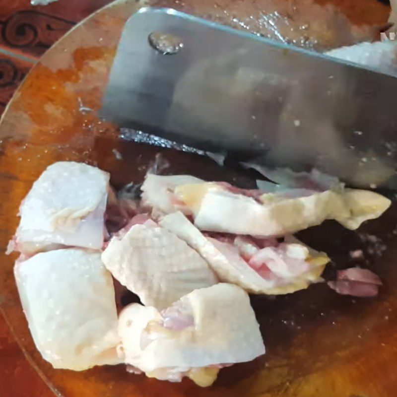 Step 1 Prepare the chicken for Chicken Hotpot with giang leaves