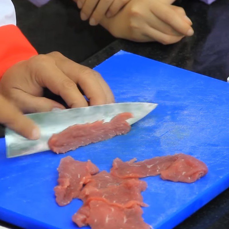 Step 2 Prepare meat and seafood for mixed tom yum hot pot