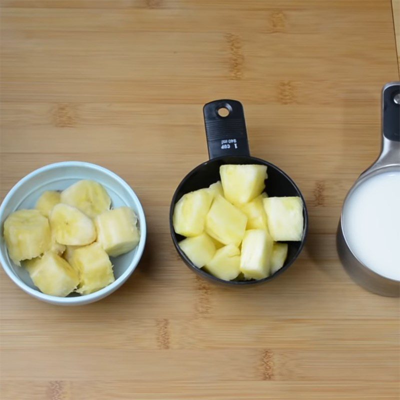 Step 1 Prepare the fruit for Pineapple and Banana Milkshake