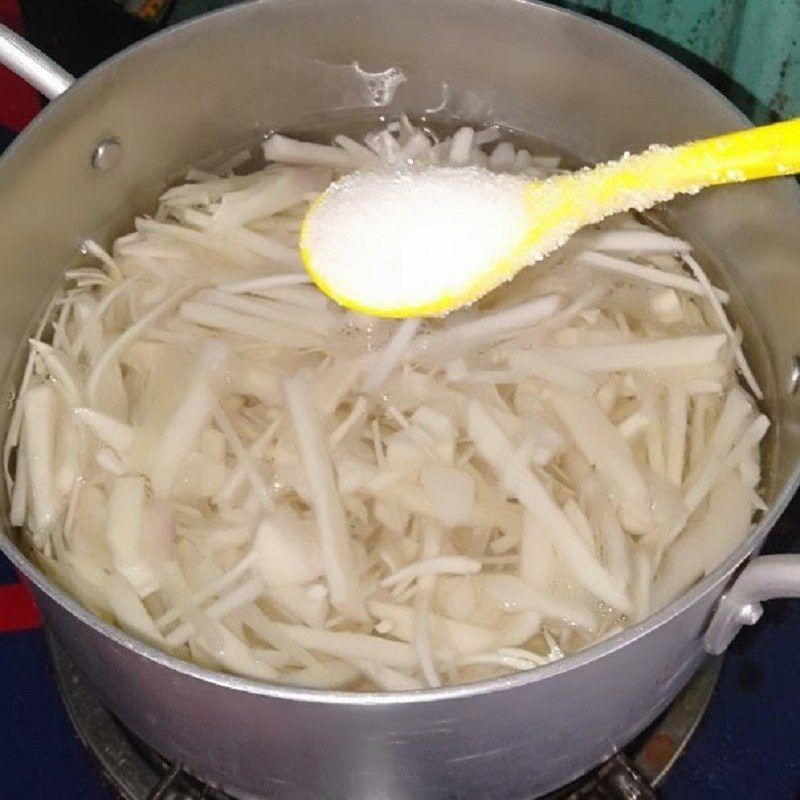Step 2 Prepare and boil bamboo shoots Stir-fried frog with bamboo shoots