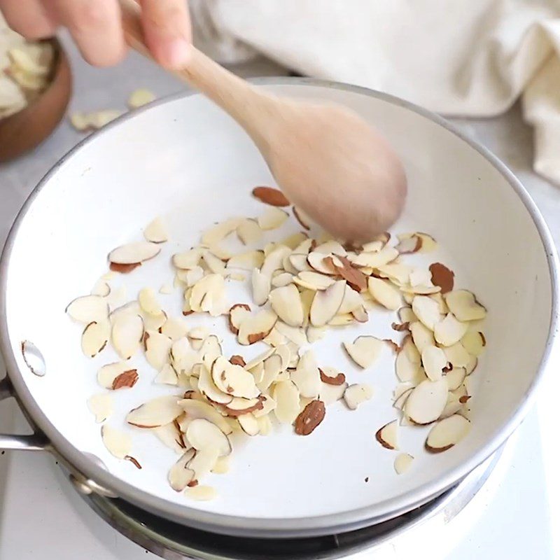 Step 2 Toast the almonds for Spinach Peach Salad
