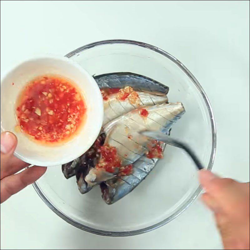 Step 2 Prepare and marinate the fish Mackerel with garlic and chili